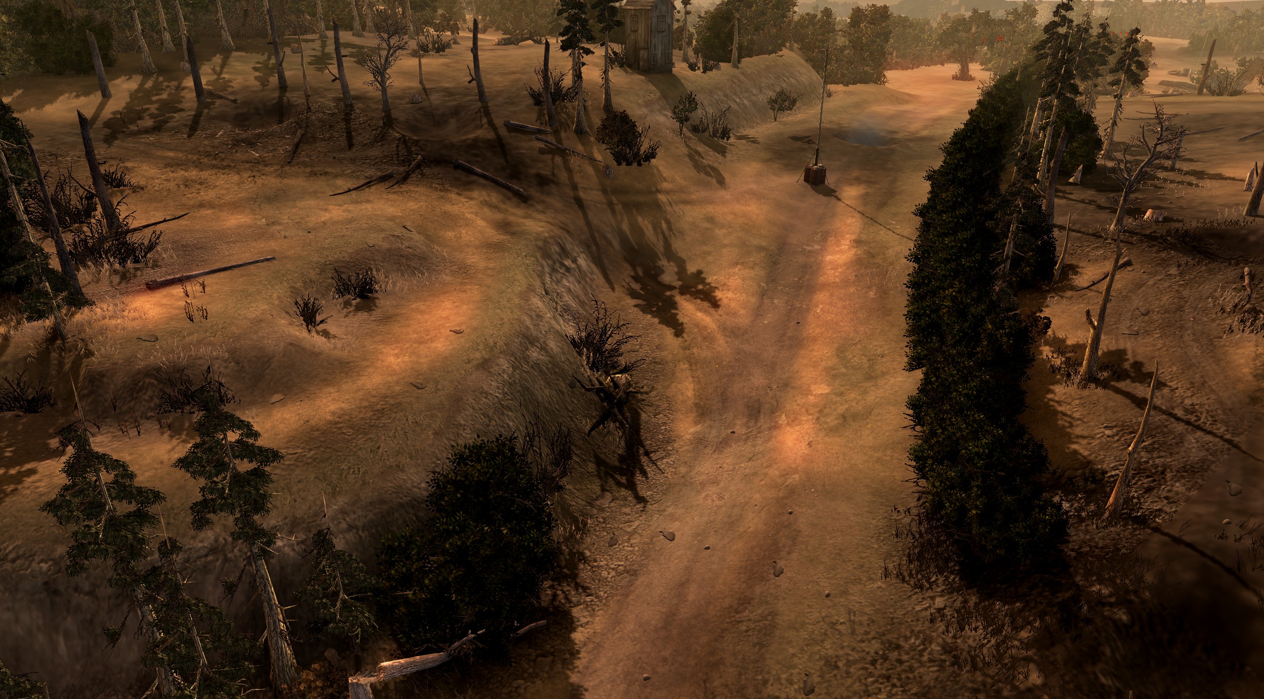 One of the roads that passes between the hills - you can block these off with mines and barbed wire, or use them as flanking routes or ways to attack the player bases without going over the hills.
